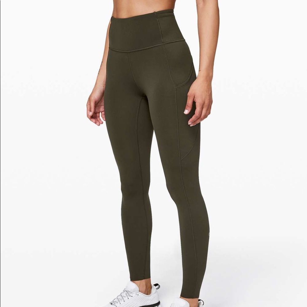 Lululemon Green Fast and Free Tights! Dark olive color in a 31 inch inseam!